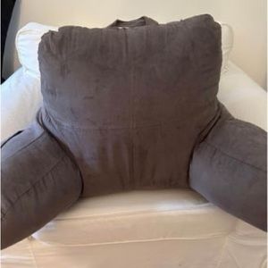 Gray bed rest pillow with arms. Great for dorms.